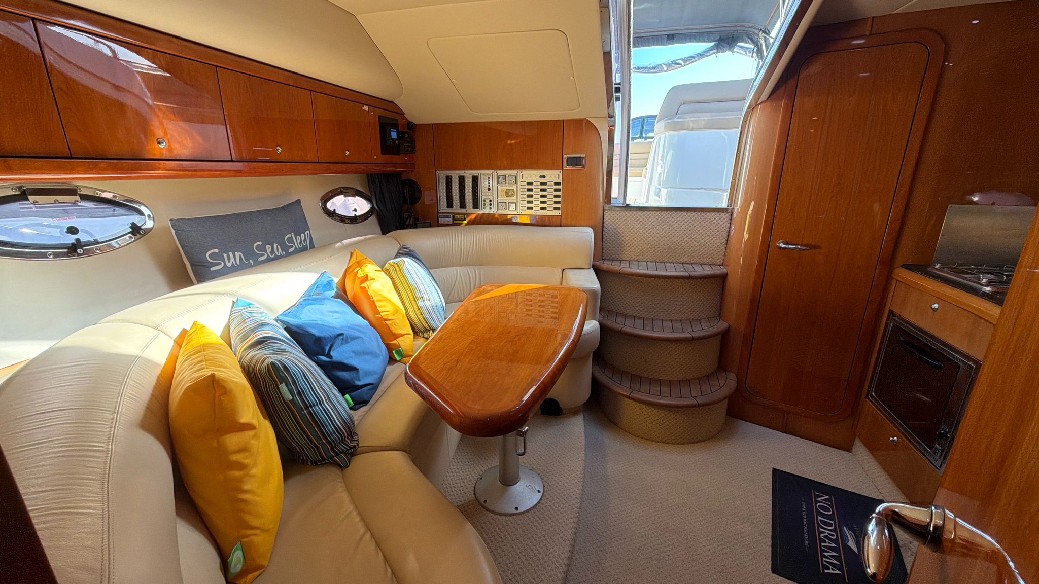 Saloon lounge area with galley and steps
